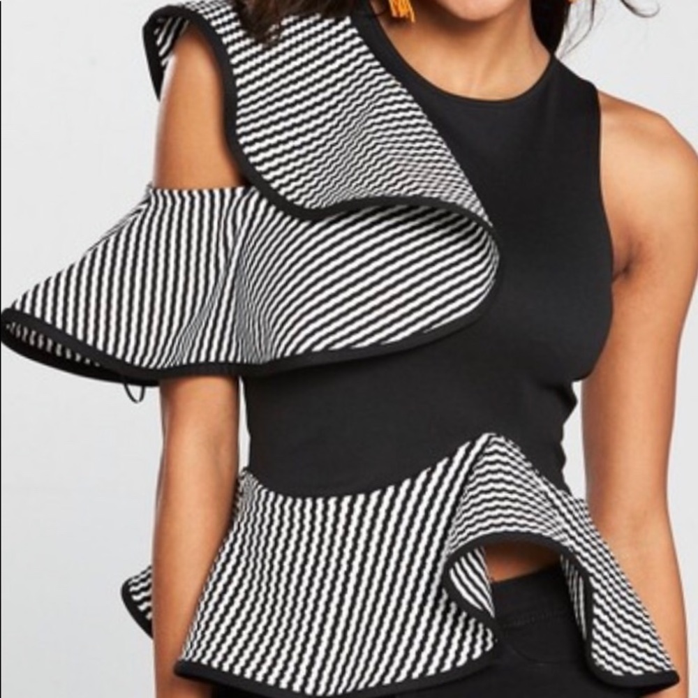 Elegant black and white peplum top